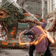 Benedict Wong's Wong uses magical ropes to lash out at a one-eyed, tentacled creature called Gargantos, as it attacks a New York City street.